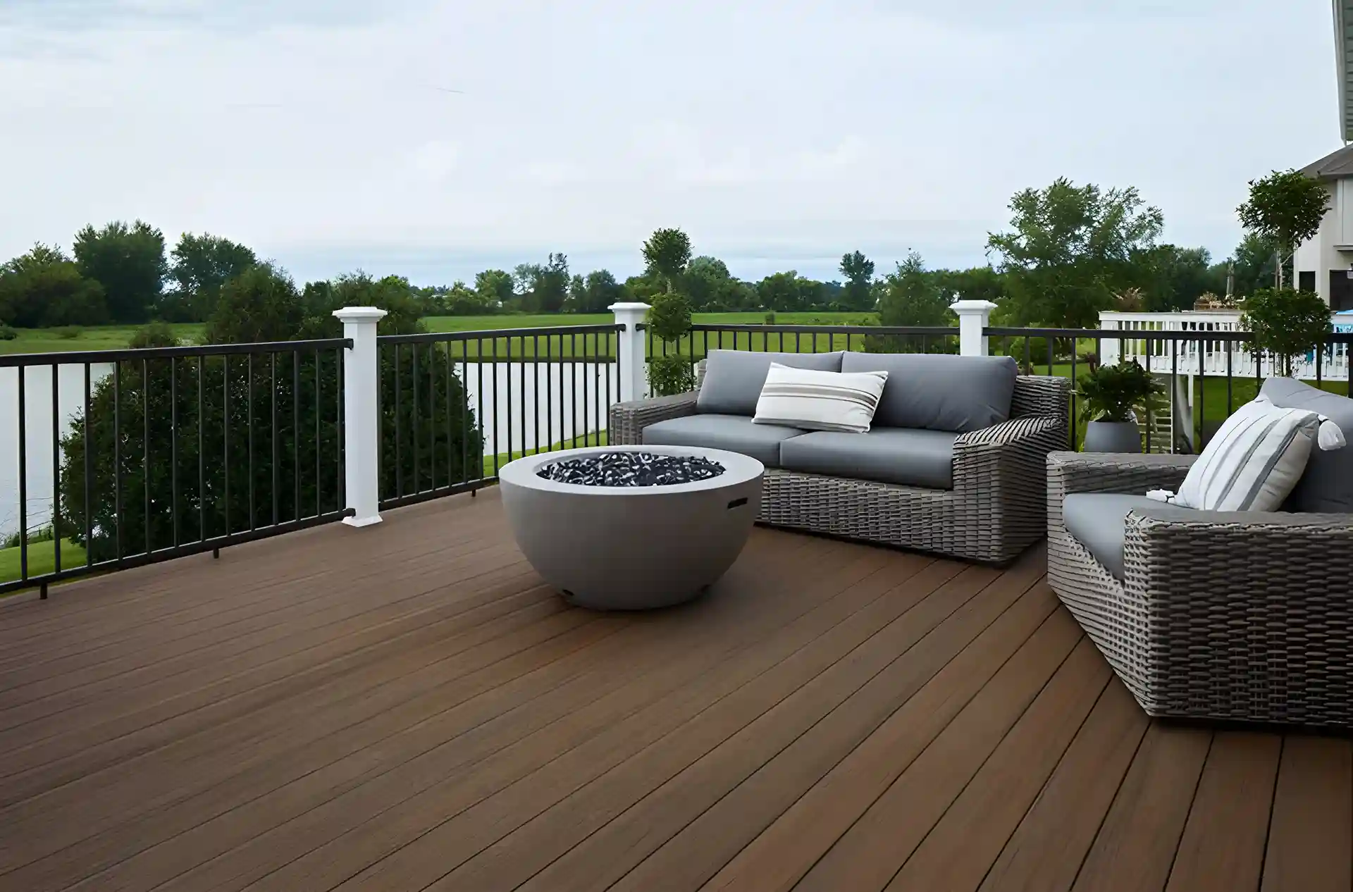best composite decking color Aerial view of a curved deck.